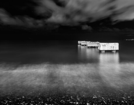 Ponton du Lido pier on the Niza coast at night