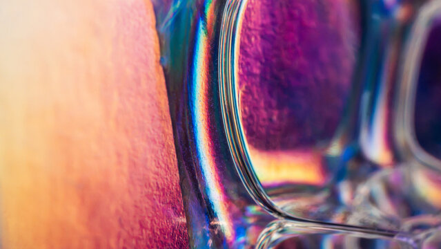 Macro view of iridescent glass surface and vivid color