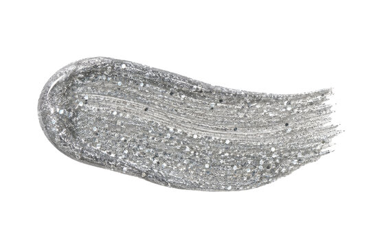 Shimmering silver glitter makeup swatch, with visible brush strokes and sparkling particles, isolated on a clean white background