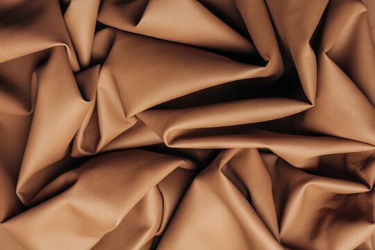 Mocha Mousse crumpled leather fabric texture background