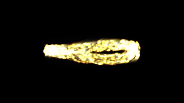 Golden sparkling comet trail moving across black background