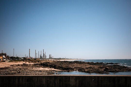 Oil refinery beside rocky Atlantic coast in Portugal