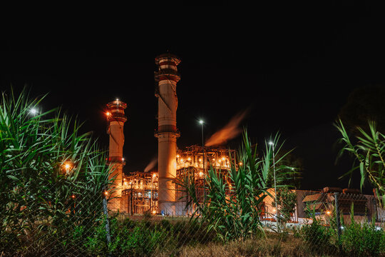 Illuminated oil refinery at night in Portugal