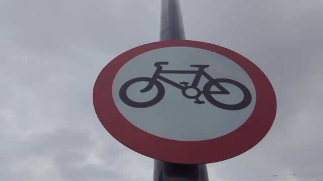 Cutaway 50fps. Bicycle sign, bike route, british road sign. 