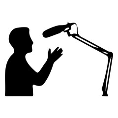 Person talking into boom microphone for audio recording and sound engineering purposes. © MdShohidul