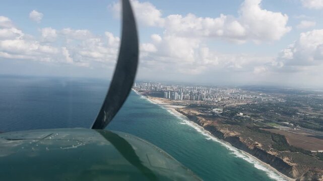 Flight over Israel coastline in a small plane