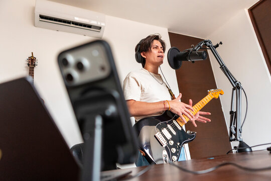 Music composer record guitar performance with smartphone camera