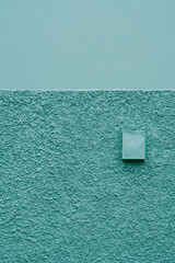 Yellow Turret Against a Mint-Green Wall in Akureyri © Viviana
