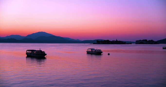 Multicolored landscape at dawn on the lake