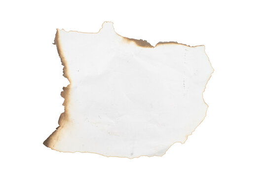 burnt holes in piece of paper isolated on white background.