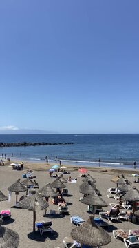 View of Playa del Bobo beach, Costa Adeje, Tenerife,Canary Islands,Spain. Travel or vacation concept,4K.	