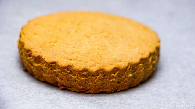 round golden-colored shortbread cookies with a wavy edge, classic shortbread, corn, product, yellow dough, 