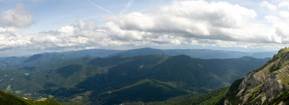 Panoramic Mountain View over Forested Valleys and Dramatic Cloudy Sky from Rax Alps Austria