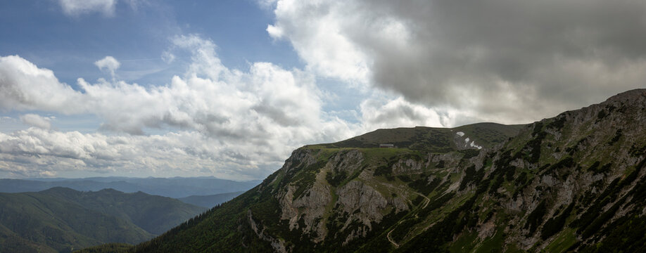 Dramatic Mountain Panorama with Rugged Limestone Cliffs, Alpine Plateau and Storm Clouds over Rax Alps Austria