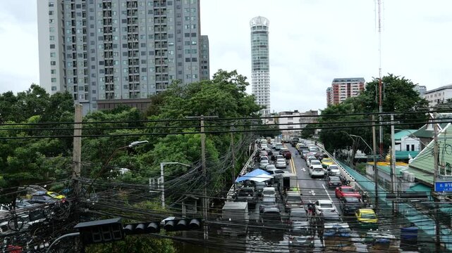 Vehicles stranded on a submerged road in Bangkok. Bangkok Flash floods caused by monsoon rains have turned all 50 districts of Bangkok into official disaster zones.