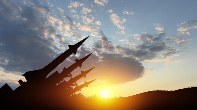 The missiles are aimed to the sky at sunset. Nuclear bomb, chemical weapons, missile defense, a system of salvo fire.