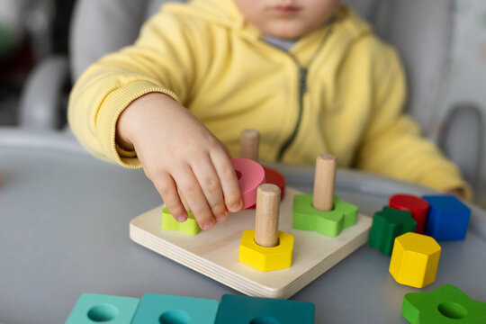 Educational toy, Cognitive skills, Montessori activity. Closeup, selective focus.