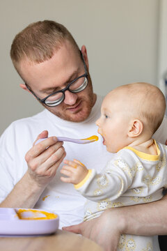 Baby with good appetite. Tasty food for babies.