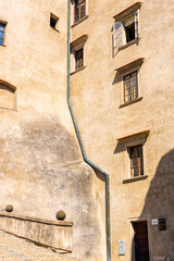Summer cityscape - close-up view of part of the architecture of the Cesky Krumlov Castle in the historical center of Cesky Krumlov, Czech Republic © rustamank