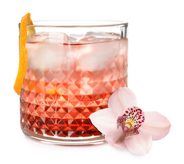 Fototapeta premium Tasty cocktail in glass and orchid flower isolated on white
