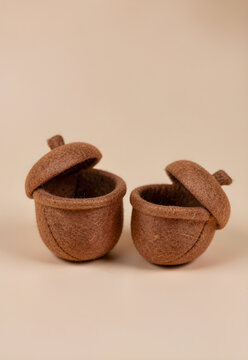 Felt acorn basket with an empty interior