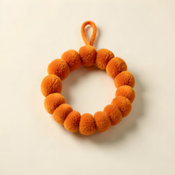 Orange wool pompom wreath