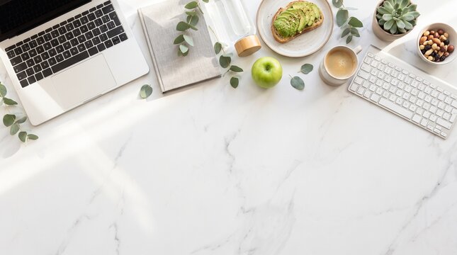 Top View of Remote Working Essentials with Laptop, Avocado Toast, and Coffee on White Marble Desk