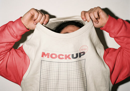 Person Removing Sweatshirt Branding Design Mockup