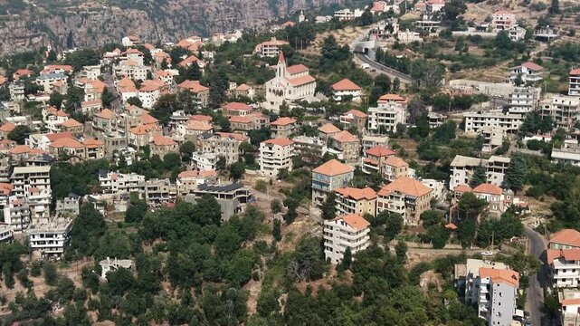 Aerial Drone View of Mountain Village and Green Valley in Hasroun,  Lebanon