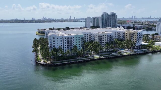 Aerial Drone View of Miami Bayfront Apartment Complex with Pool and Skyline, HD