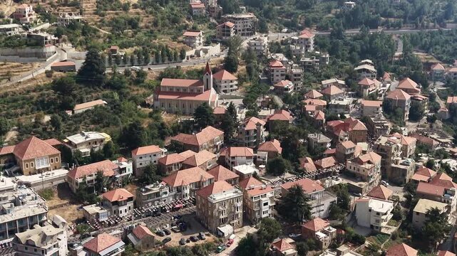 Aerial Drone View of Mountain Village and Green Valley in Hasroun,  Lebanon