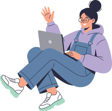 Smiling Young Woman with Glasses Waving While Using Laptop Wearing Purple Hoodie and Overalls