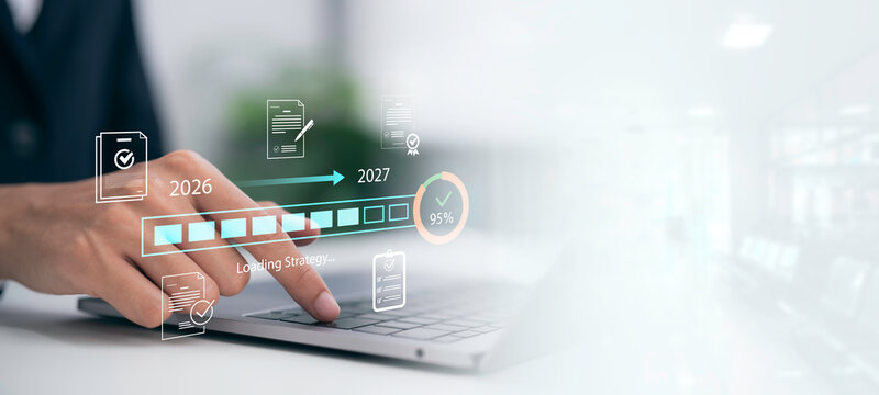 Digital strategy concept showing professional using laptop to track business progress, project planning and performance targets with completion indicators, timeline and future goals