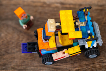 Obraz premium transformer car LEGO bricks plastic blocks toys, Gaming culture and block building hobby, Creative Educational toy game merchandise children play, children's playroom, Childhood play and creativity