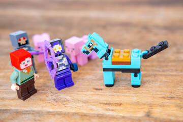 Obraz premium Lego minecraft plastic figures, block toys, pixel game characters, creative building bricks, hobby collection, Creative Educational toy game merchandise children play, Childhood play and creativity