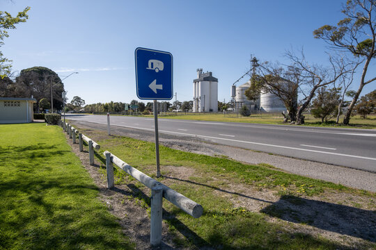 A directional road sign along the Dukes Highway in Keith, South Australia, guides caravans or campervans to safely exit the main road to access local rest areas, camping grounds, and park amenities.