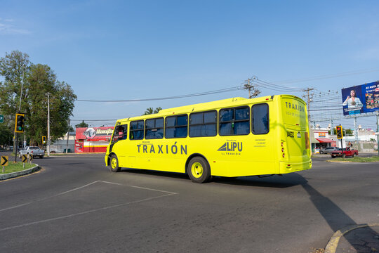 Fluorescent yellow Lipu personnel transport bus, by Mexico's Grupo Traxion. Jalisco, Mexico, July 20, 2026.