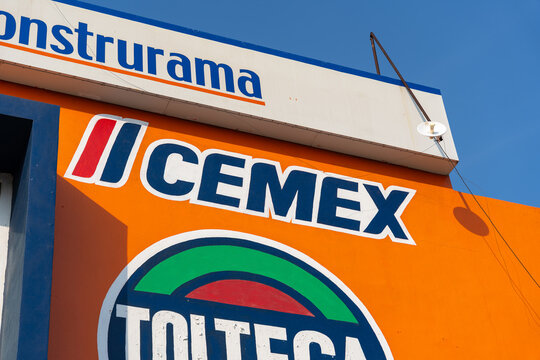 Cemex and Cemento Tolteca logos on Construrama hardware store facade. Jalisco, Mexico, July 20, 2026.