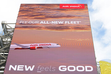 Obraz premium large-format electronic billboard featuring ad for Air India over building at 302 Yonge St facing Sankofa Square, Toronto