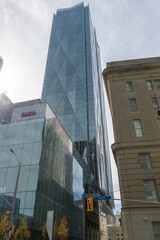 Obraz premium another view of CIBC Square (north towers at 141 Bay St) from Yonge St with contrasting historic Dominion Public Building, 1 Front St, Toronto