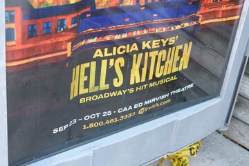 Obraz premium lower section of a transit shelter advertising poster for Alicia Keys’ Hell’s Kitchen at the CAA Ed Mirvish Theatre, Toronto