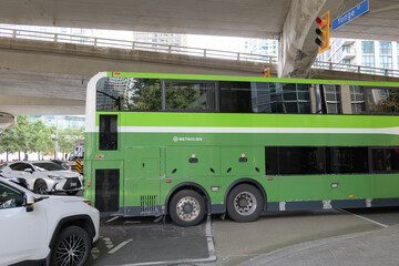 Fototapeta premium rear of a Metrolinx Go bus heading westbound on Lake Shore Blvd W at Yonge St, Toronto