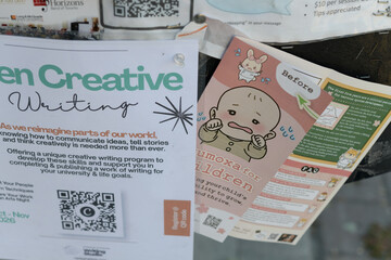 Fototapeta premium street posters and pamphlets on a community message board in Toronto (Creative Writing, child development)