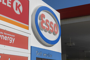 Fototapeta premium signage at an Esso gas station located at 381 Mount Pleasant Rd, Toronto