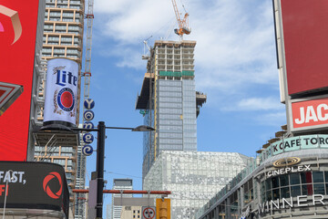 Fototapeta premium (at center) construction of Concord Sky Condo at 391 Yonge St, viewed looking north on Yonge St just south of Sankofa Square, Toronto
