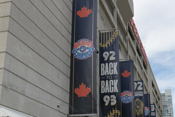 Fototapeta premium celebratory banners on the east facing wall of the Rogers Centre, a stadium and home of the Toronto Blue Jays