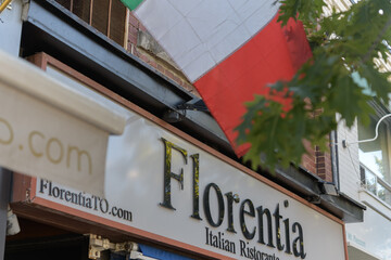 Fototapeta premium signage over entrance to Florentia, an Italian restaurant, located at 570 Mount Pleasant Rd, Toronto