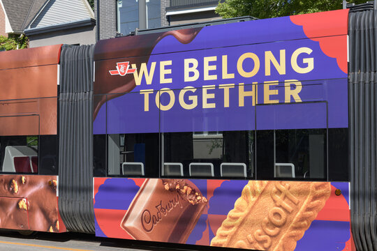 Toronto streetcar wrap feat new Cadbury Dairy Milk Biscoff product being advertised in Canada