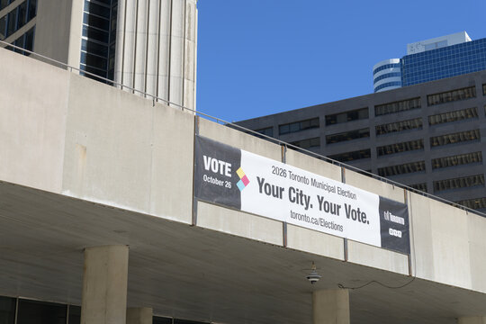 closer view of banner outside Toronto's City Hall for upcoming elections 2026