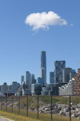 Fototapeta premium fluffy cloud over Toronto viewed from Biidaasige Park